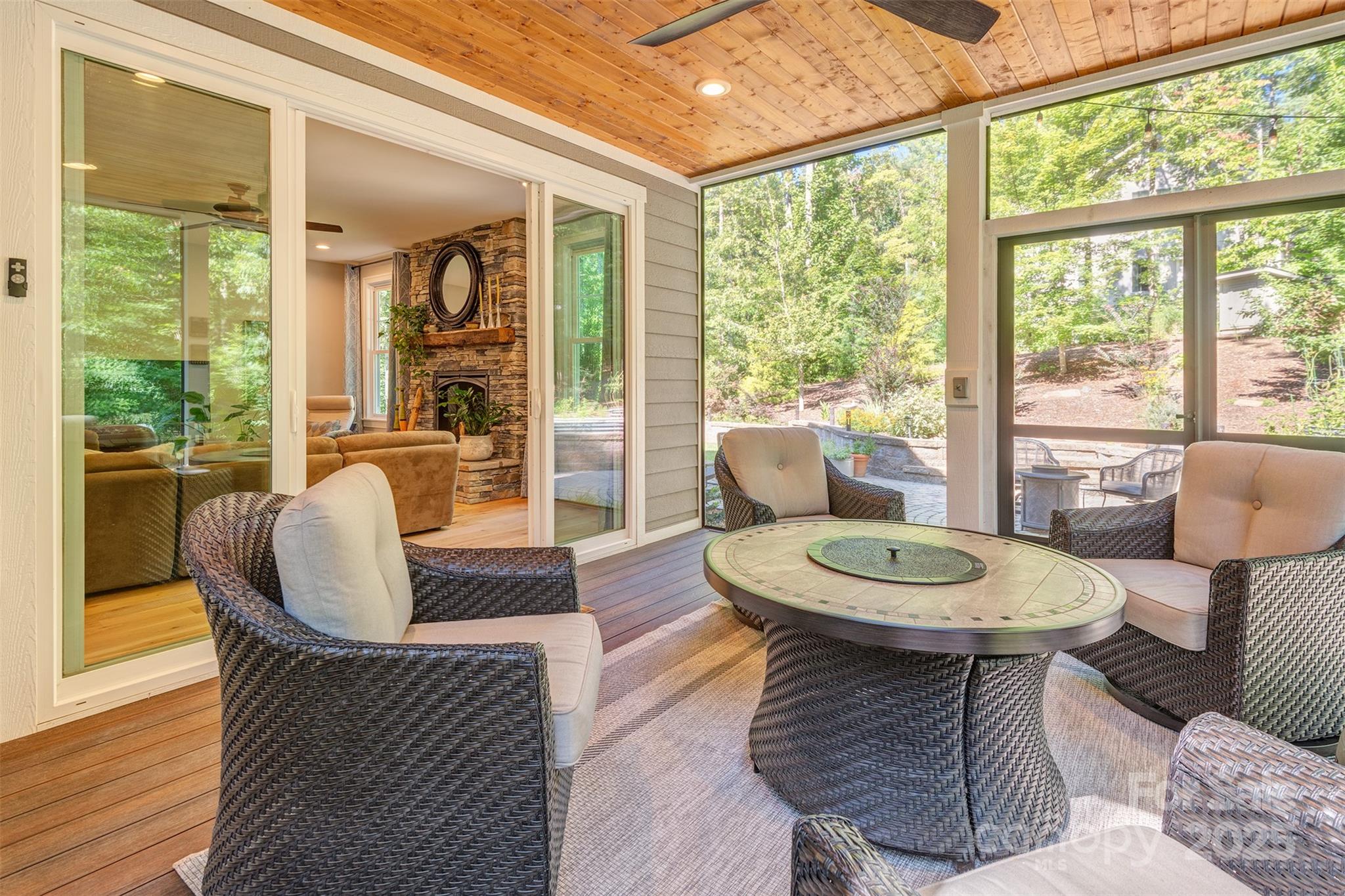 21 Ducketts Grove Road Fletcher, NC 28732 - Photo 34 of 42 a living room with furniture a large window and dining table