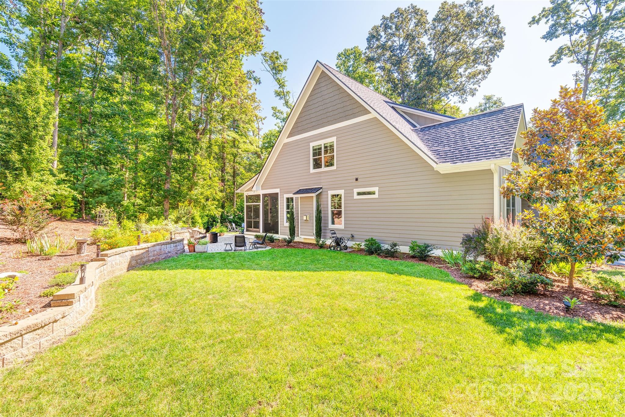 21 Ducketts Grove Road Fletcher, NC 28732 - Photo 37 of 42 a view of a house with a yard and sitting area