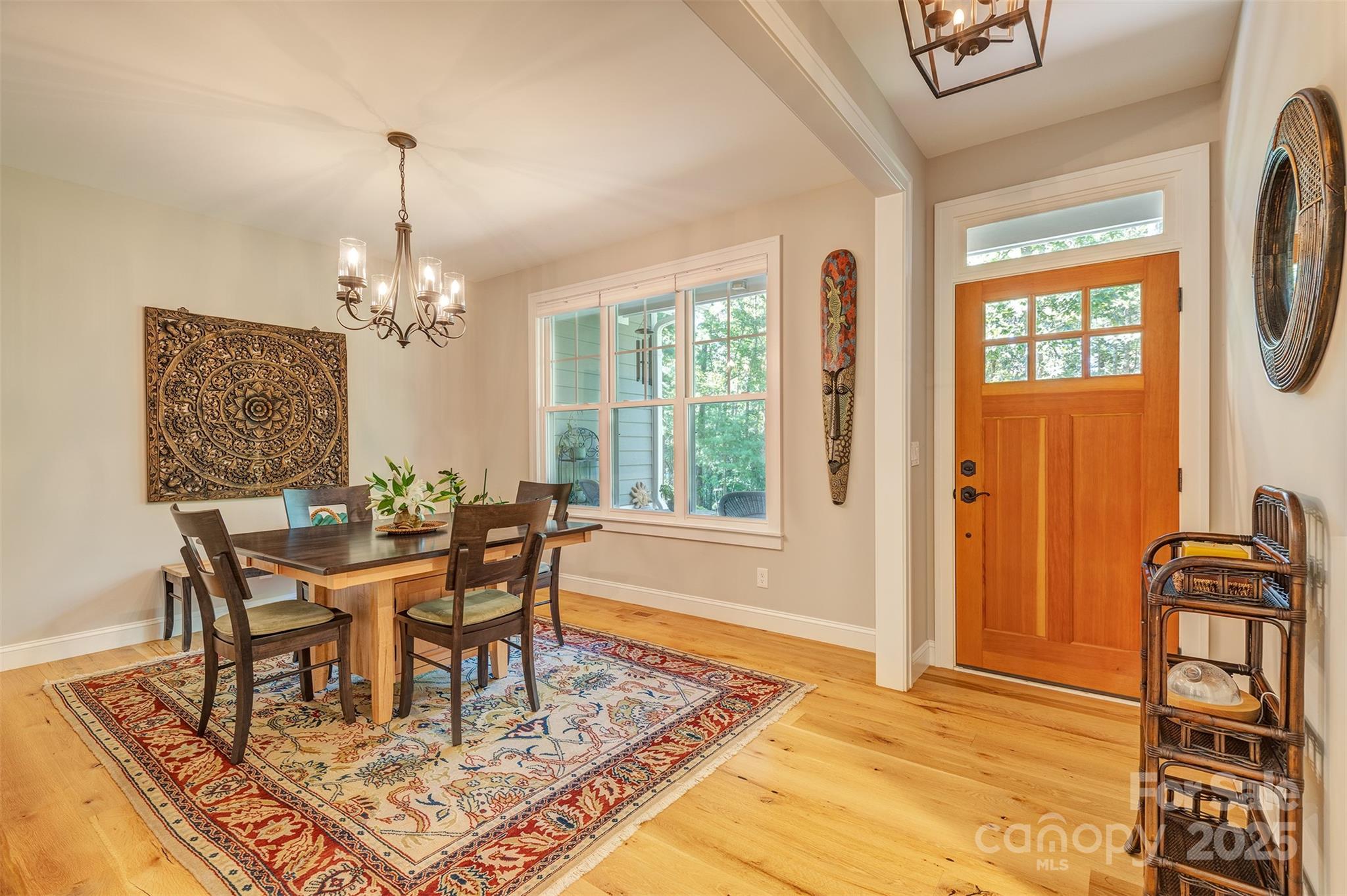 21 Ducketts Grove Road Fletcher, NC 28732 - Photo 4 of 42 a view of a dining room with furniture window and wooden floor