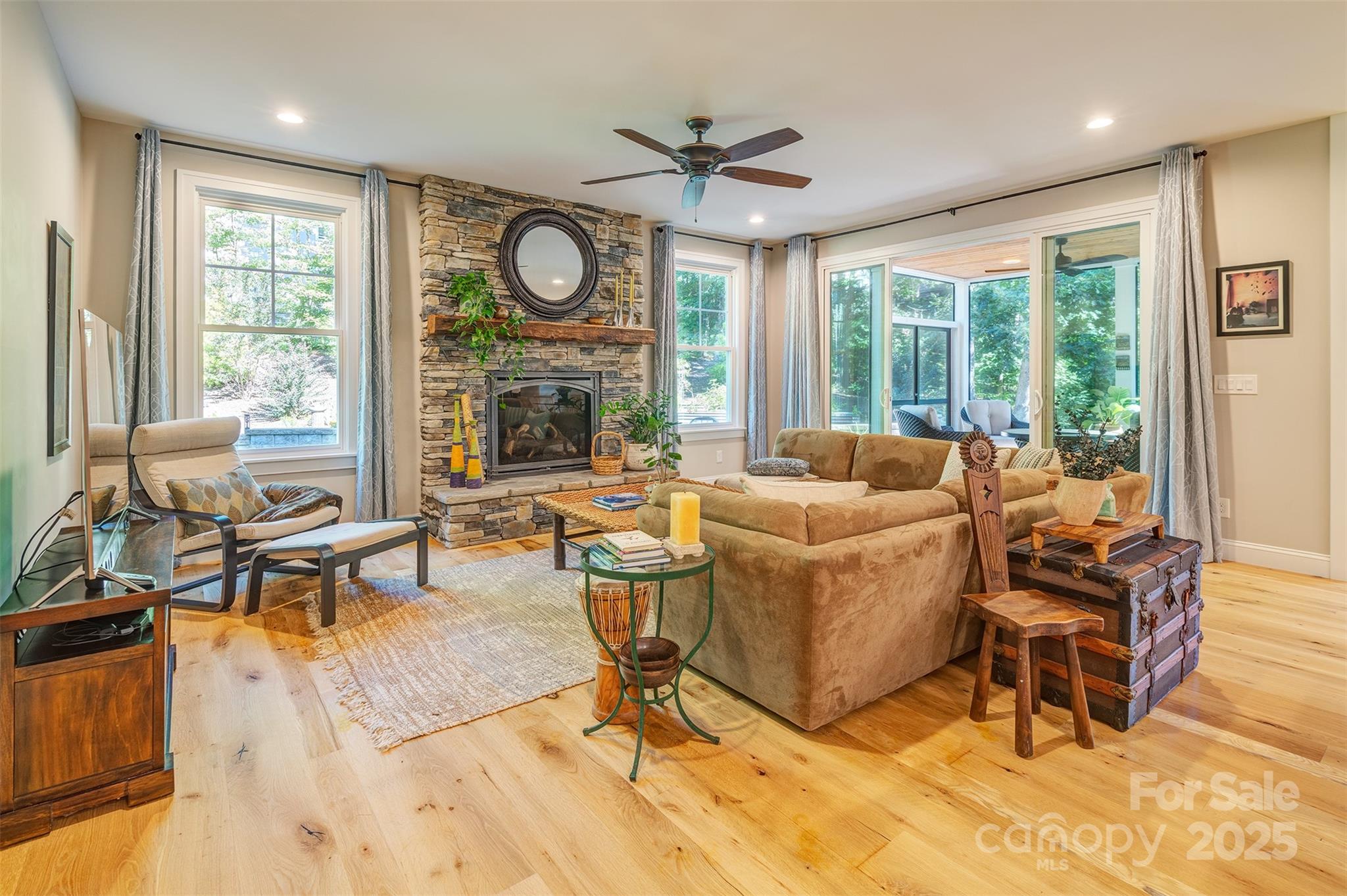 21 Ducketts Grove Road Fletcher, NC 28732 - Photo 7 of 42 a living room with fireplace furniture and a large window