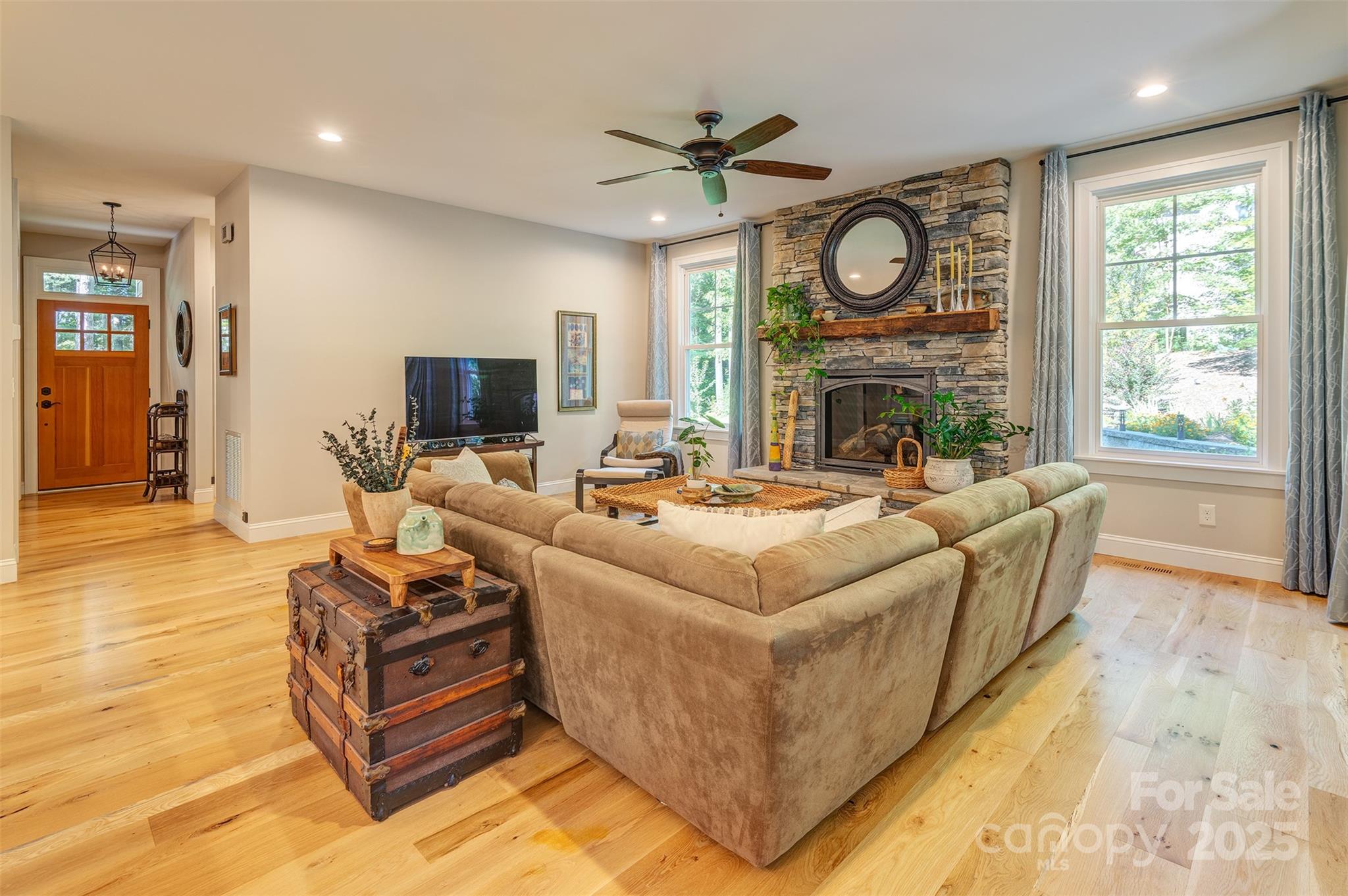 21 Ducketts Grove Road Fletcher, NC 28732 - Photo 8 of 42 a living room with fireplace furniture and a large window