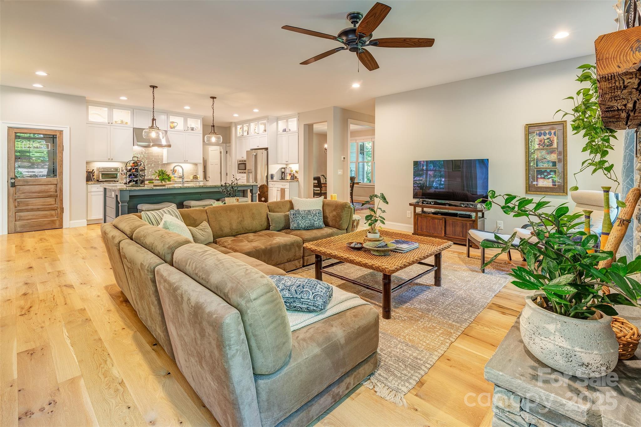 21 Ducketts Grove Road Fletcher, NC 28732 - Photo 9 of 42 a living room with furniture and a flat screen tv