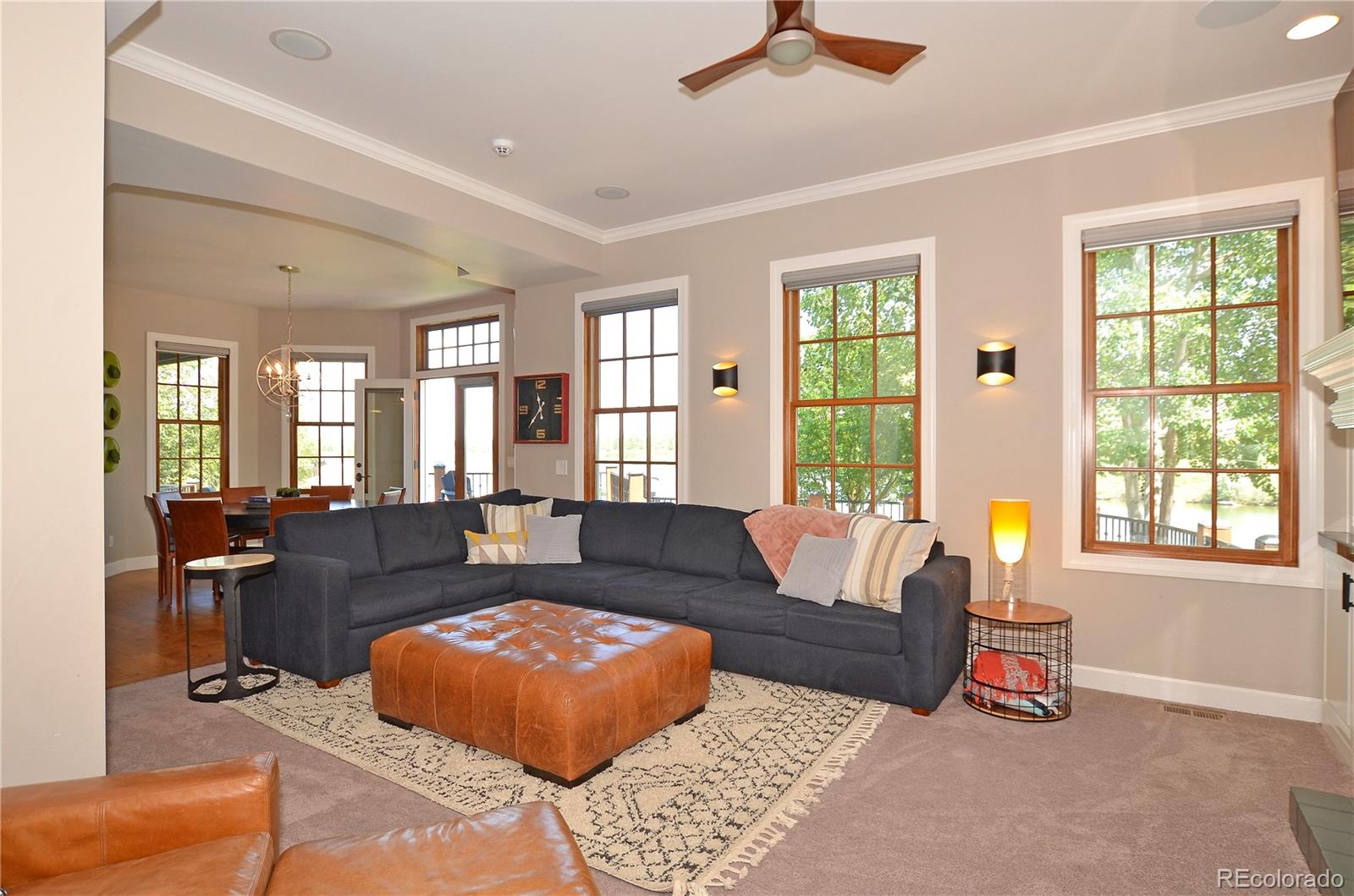 1820 Seashell Court Windsor, CO 80550 - Photo 13 of 40 a living room with furniture and a large window