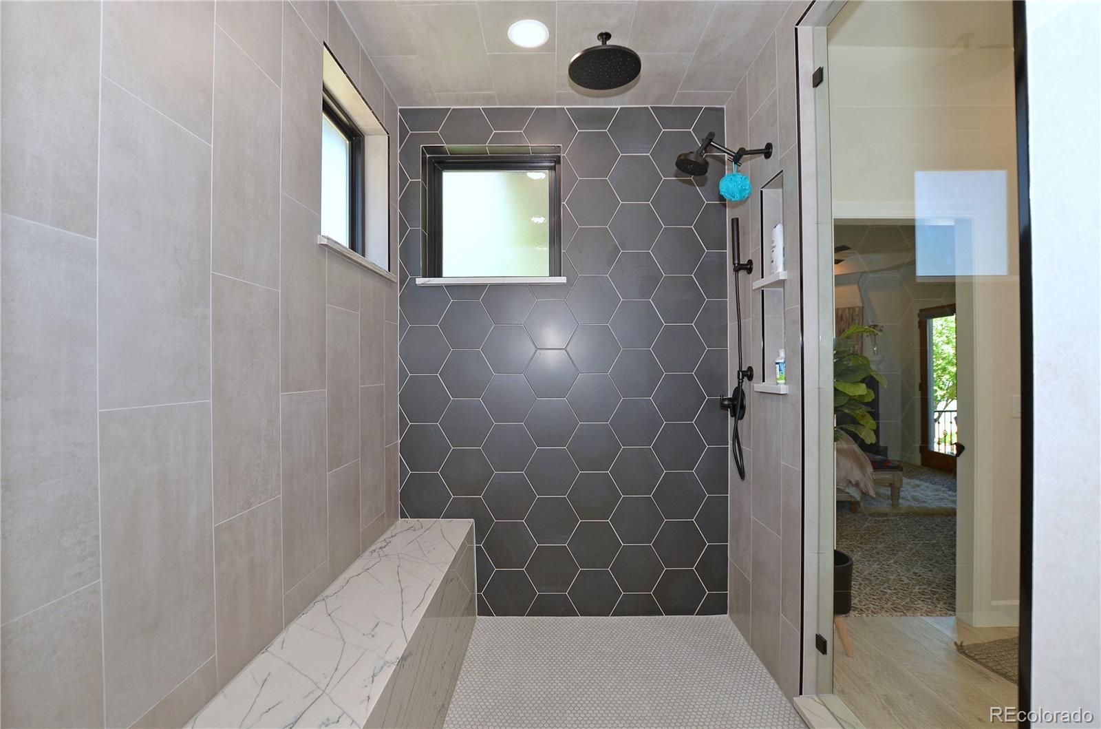 1820 Seashell Court Windsor, CO 80550 - Photo 21 of 40 a bathroom with a shower