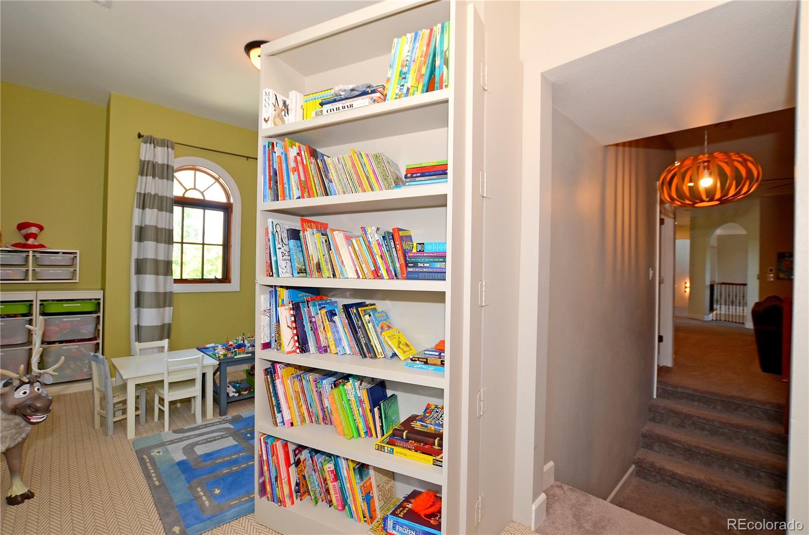 1820 Seashell Court Windsor, CO 80550 - Photo 26 of 40 a view of room with toys and wooden floor
