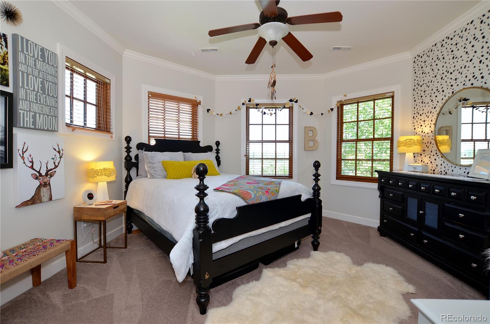 1820 Seashell Court Windsor, CO 80550 - Photo 27 of 40 a bedroom with a bed dresser and a window