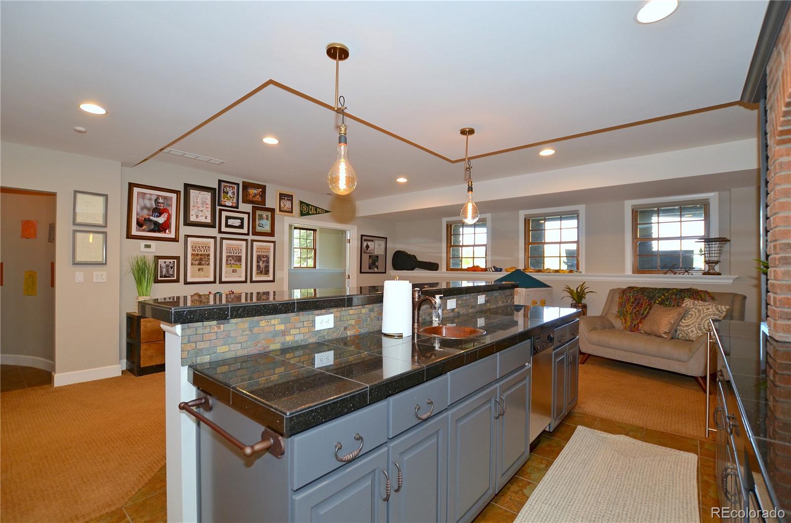 1820 Seashell Court Windsor, CO 80550 - Photo 30 of 40 a kitchen with a stove and a refrigerator