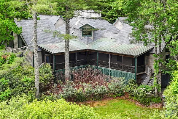 front view of a house with a garden
