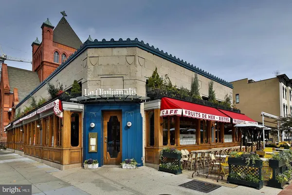 a view of a sign board with a street sign