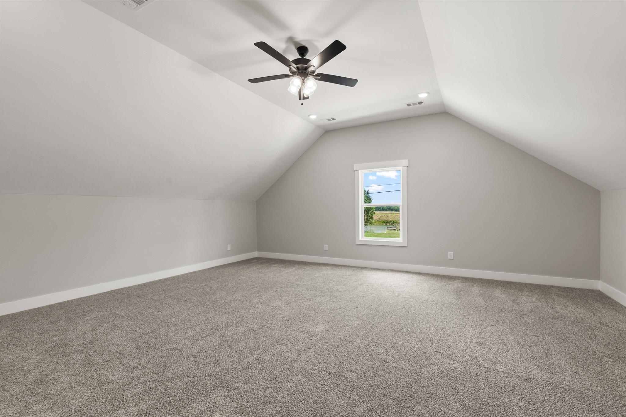 5638 Borthick Road Springfield, TN 37172 - Photo 35 of 43 an empty room with windows and ceiling fan