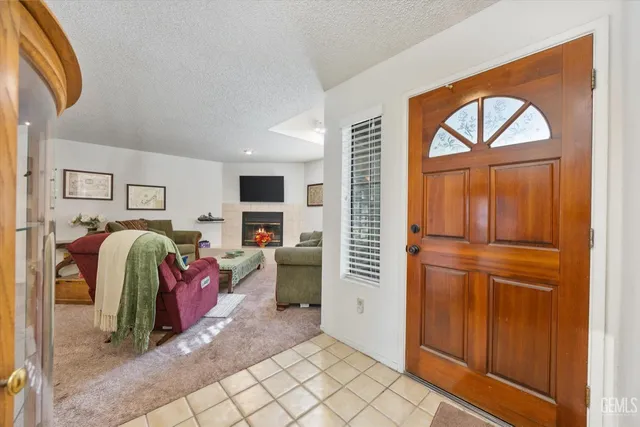 a bed room with a bed and a mirror