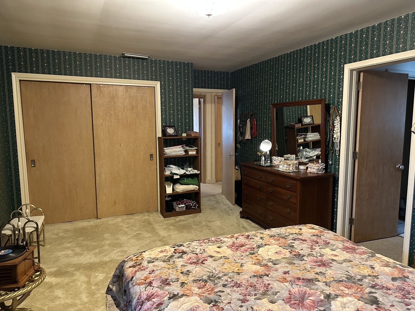 107 Towne Street Morrison, IL 61270 - Photo 13 of 29 a bedroom with a bed and dresser