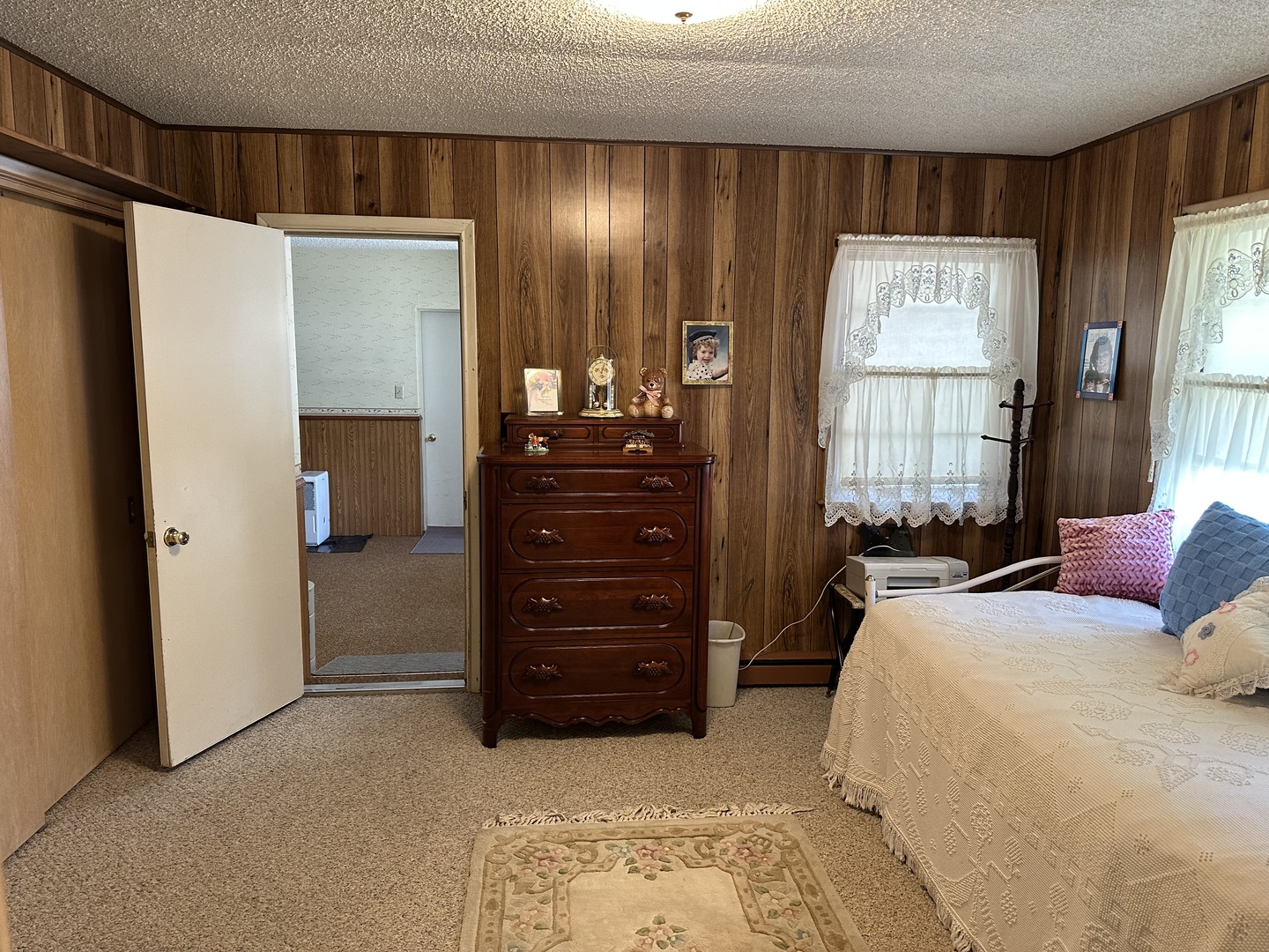107 Towne Street Morrison, IL 61270 - Photo 16 of 29 a bedroom with a bed and a dresser