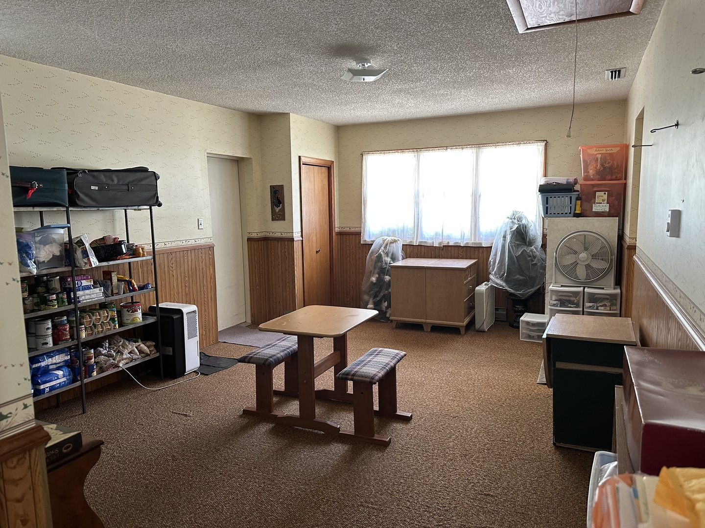 107 Towne Street Morrison, IL 61270 - Photo 21 of 29 a living room with furniture and a window