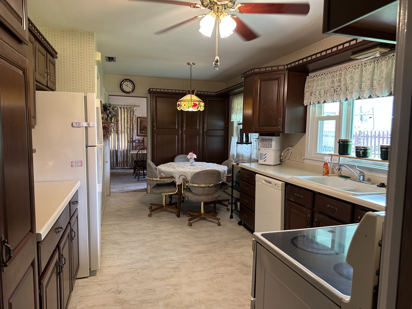 107 Towne Street Morrison, IL 61270 - Photo 8 of 29 a kitchen with sink and refrigerator