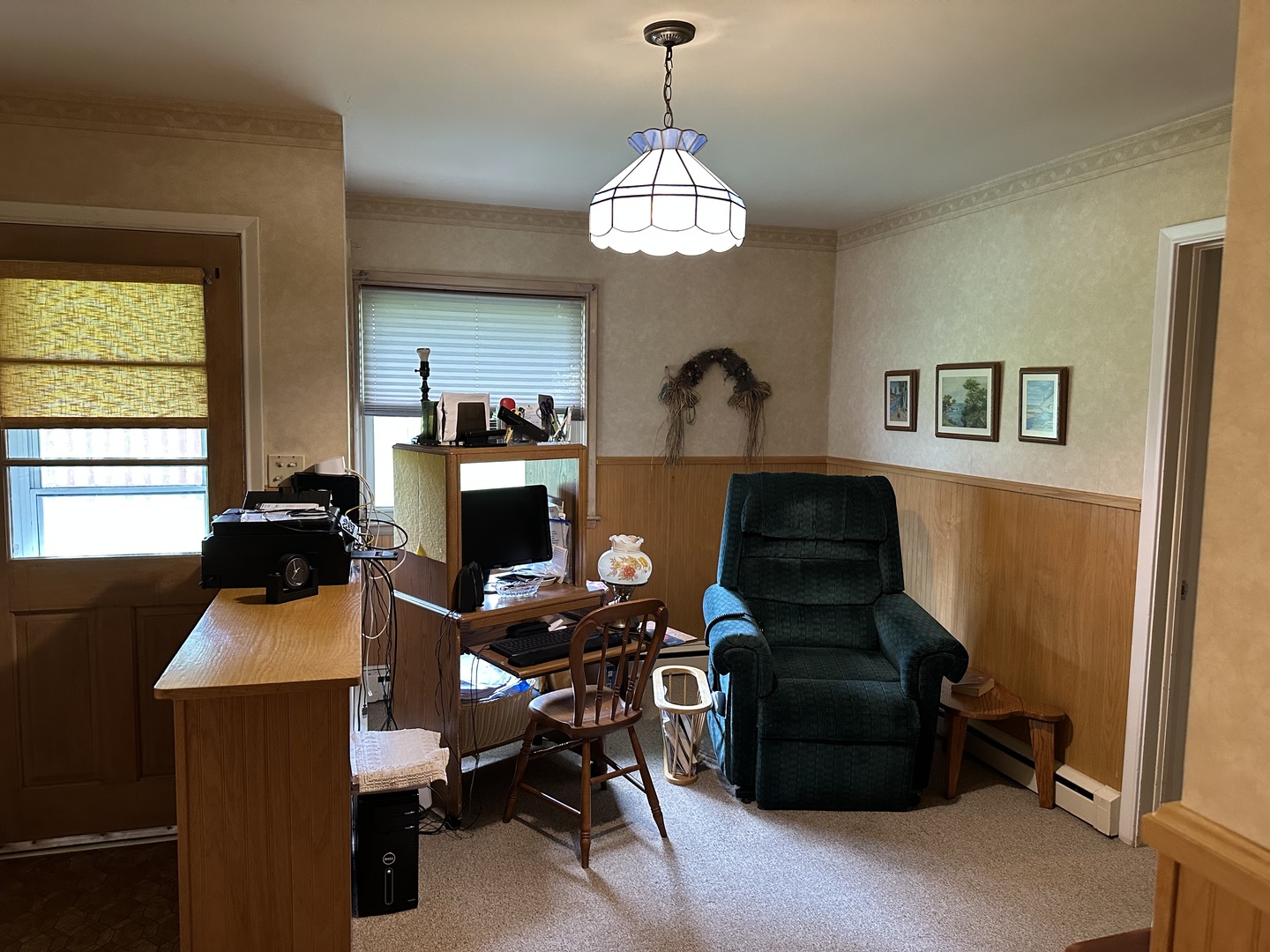 107 Towne Street Morrison, IL 61270 - Photo 9 of 29 a view of a workspace with furniture and a window