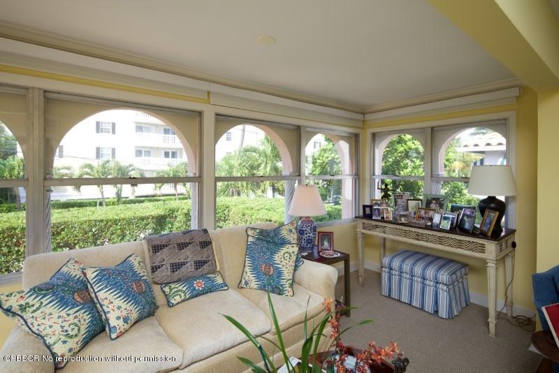 339 Cocoanut Row Palm Beach, FL 33480 - Photo 13 of 25 a living room with furniture and a large window