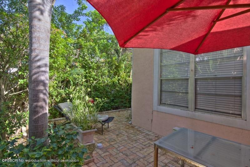 339 Cocoanut Row Palm Beach, FL 33480 - Photo 20 of 25 a view of a chair and table in the patio