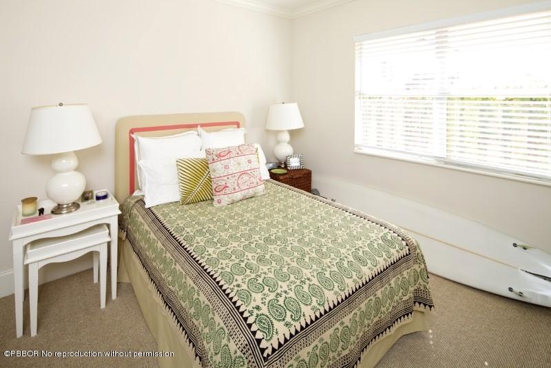 339 Cocoanut Row Palm Beach, FL 33480 - Photo 21 of 25 a bedroom with a bed and a window