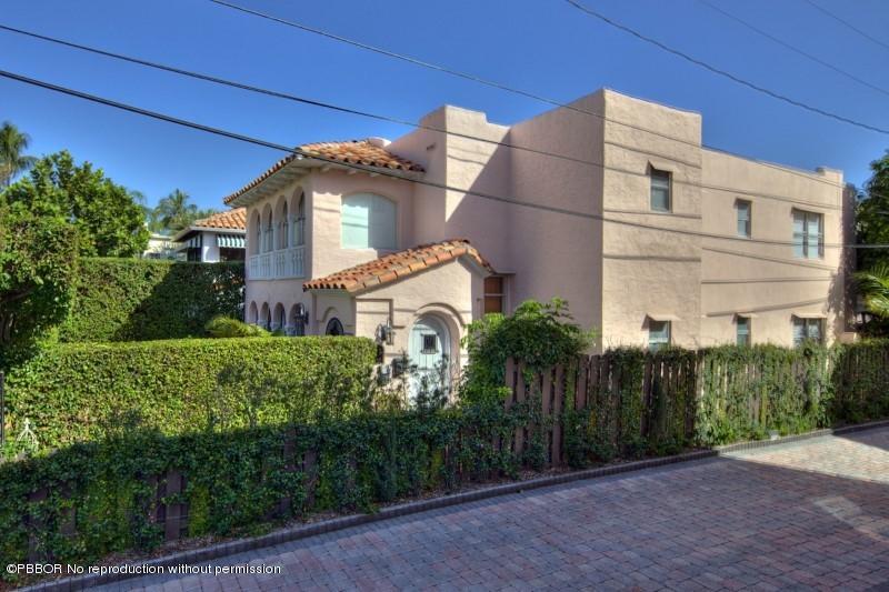 339 Cocoanut Row Palm Beach, FL 33480 - Photo 24 of 25 a view of a building with a yard