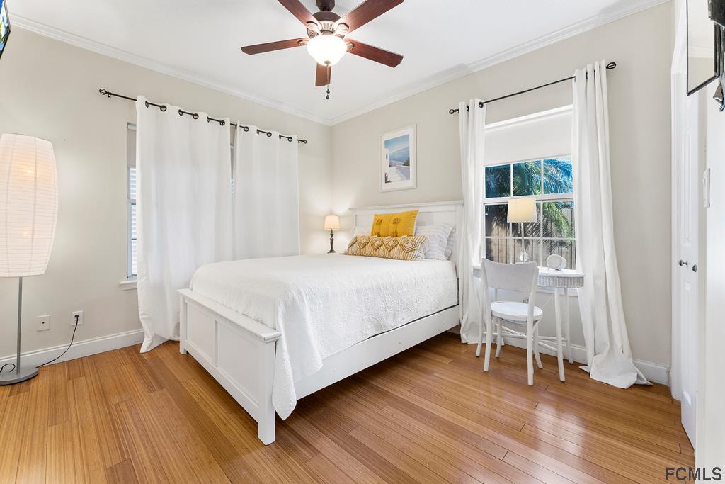 7619 A1A South St. Augustine, FL 32080 - Photo 28 of 51 a bedroom with a bed and a window