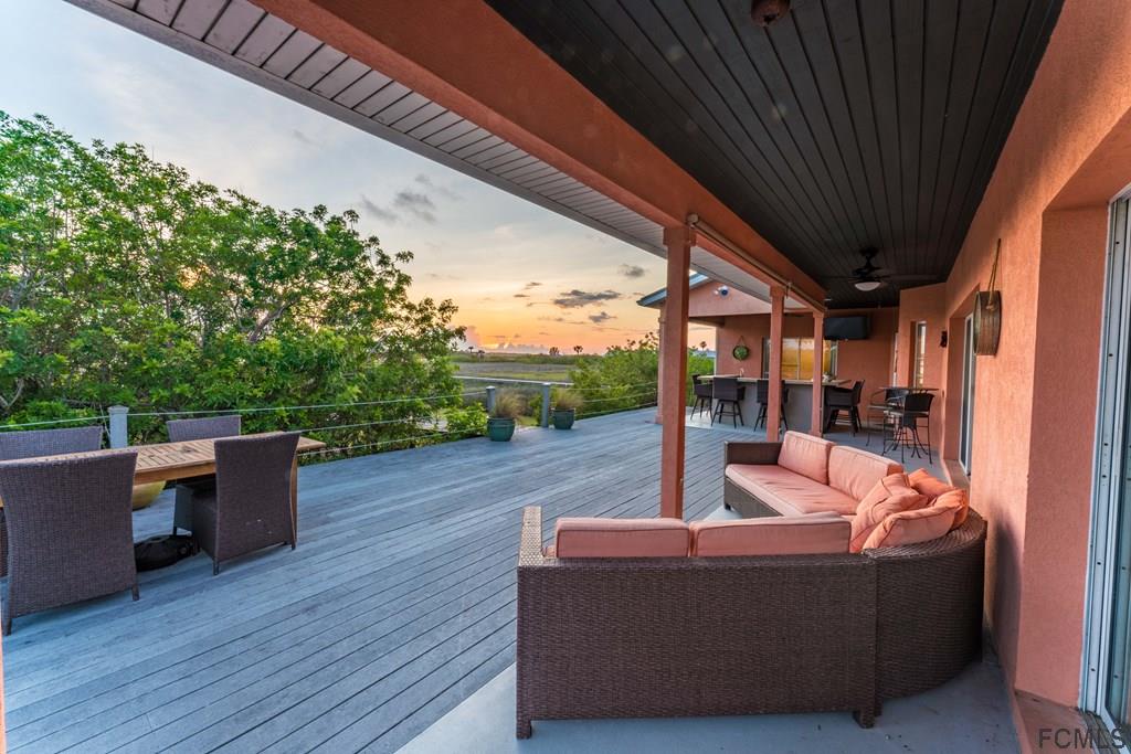 7619 A1A South St. Augustine, FL 32080 - Photo 32 of 51 a outdoor living space with furniture