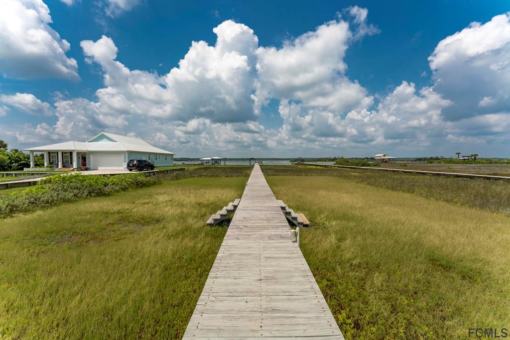 7619 A1A South St. Augustine, FL 32080 - Photo 39 of 51 a view of swimming pool in front of house