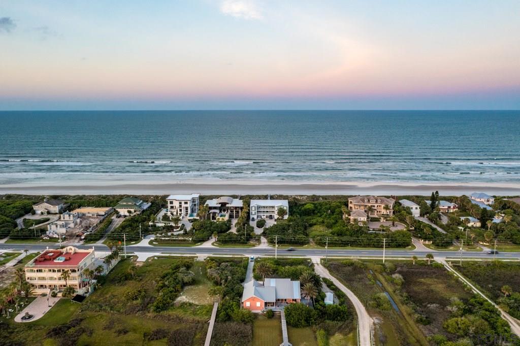 7619 A1A South St. Augustine, FL 32080 - Photo 4 of 51 a view of swimming pool with outdoor seating and yard in back