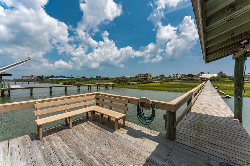 7619 A1A South St. Augustine, FL 32080 - Photo 45 of 51 swimming pool view with a lake view in the background
