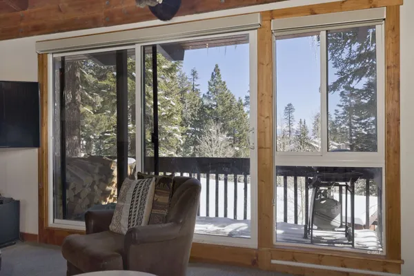 a view of a porch with a furniture