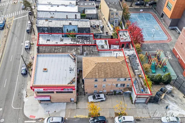 a view of a building with sitting area