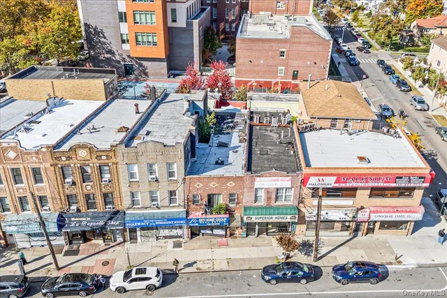 a utility room with multiple dryer and washer