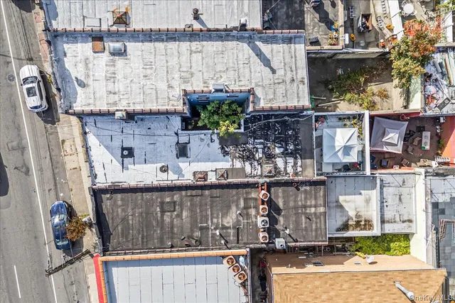 a aerial view of a house with swimming pool