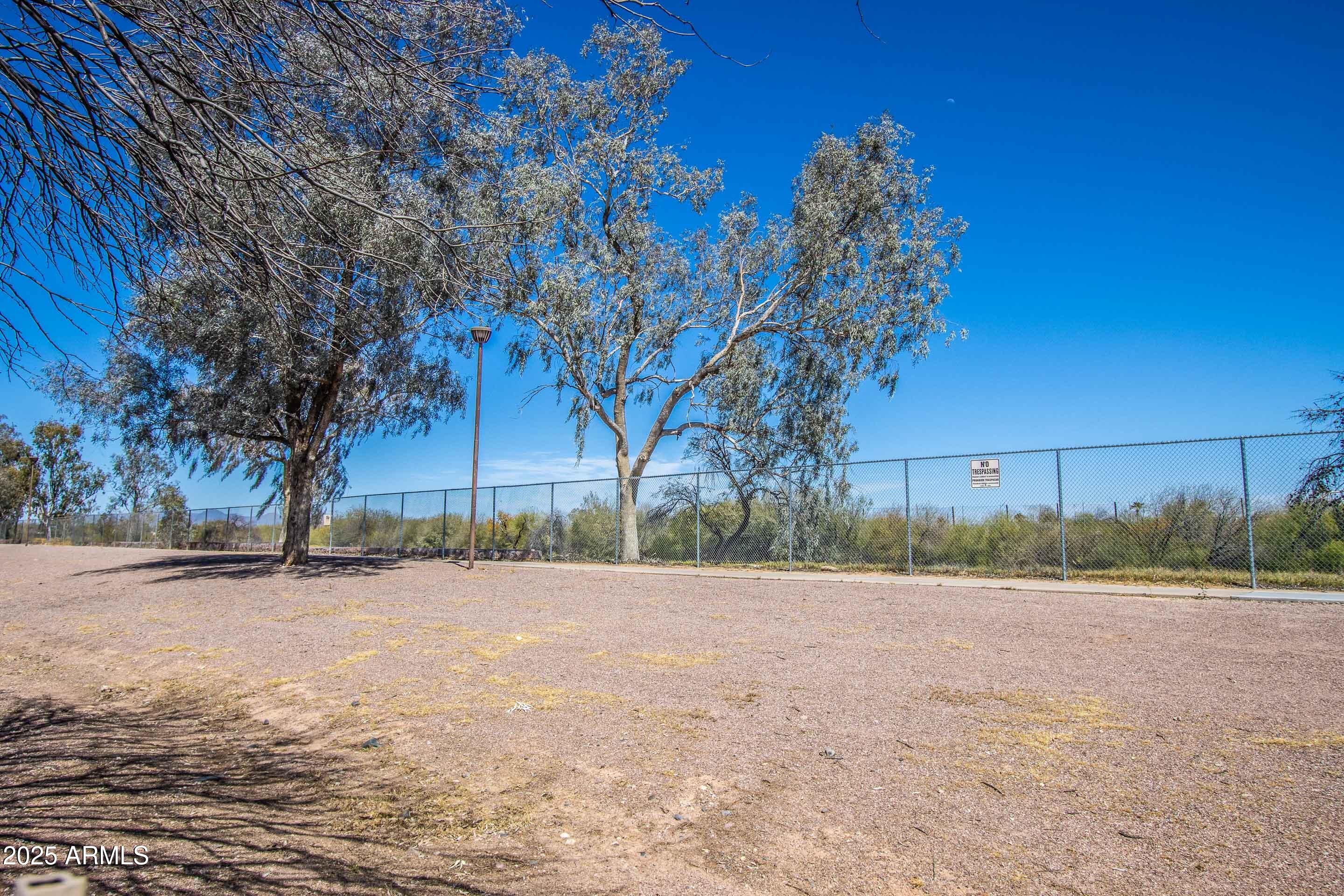 1318 East Cobb Drive Tempe, AZ 85288 - Photo 42 of 43 a backyard of a house with lots of green space