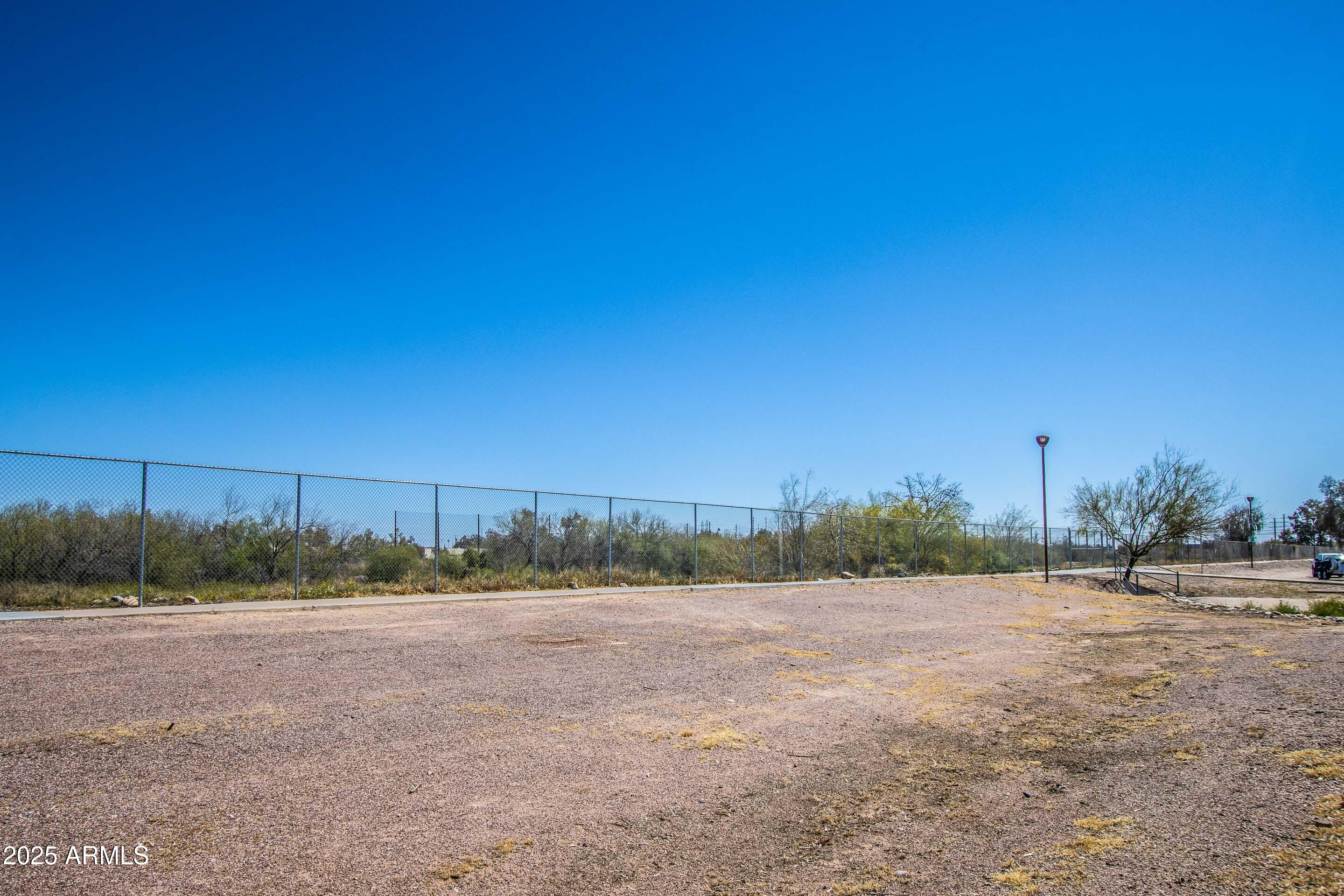 1318 East Cobb Drive Tempe, AZ 85288 - Photo 43 of 43 a view of a field with trees in background