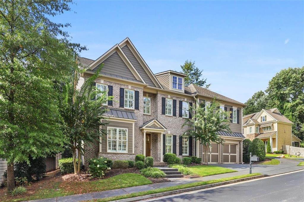 301 Valley Brook Way Atlanta, GA 30342 - Photo 1 of 1 front view of a house with a yard