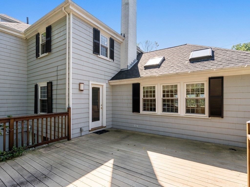 22 Howe Road Newton, MA 02459 - Photo 24 of 31 a view of a house with wooden deck