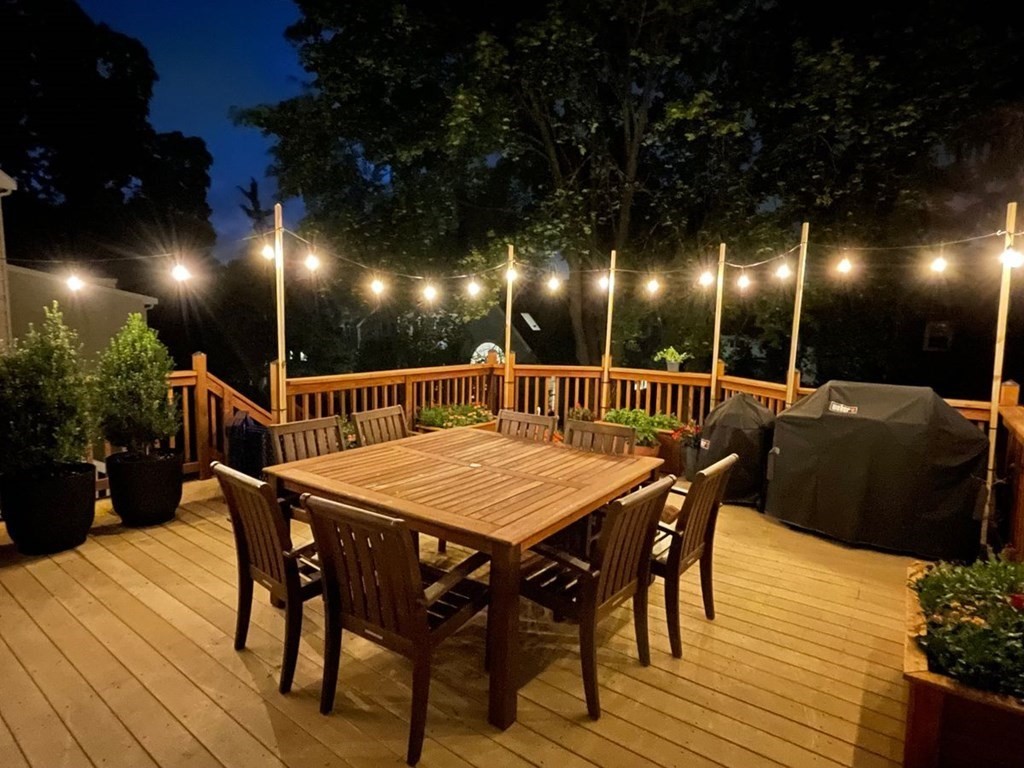 22 Howe Road Newton, MA 02459 - Photo 26 of 31 a view of a table and chairs in patio