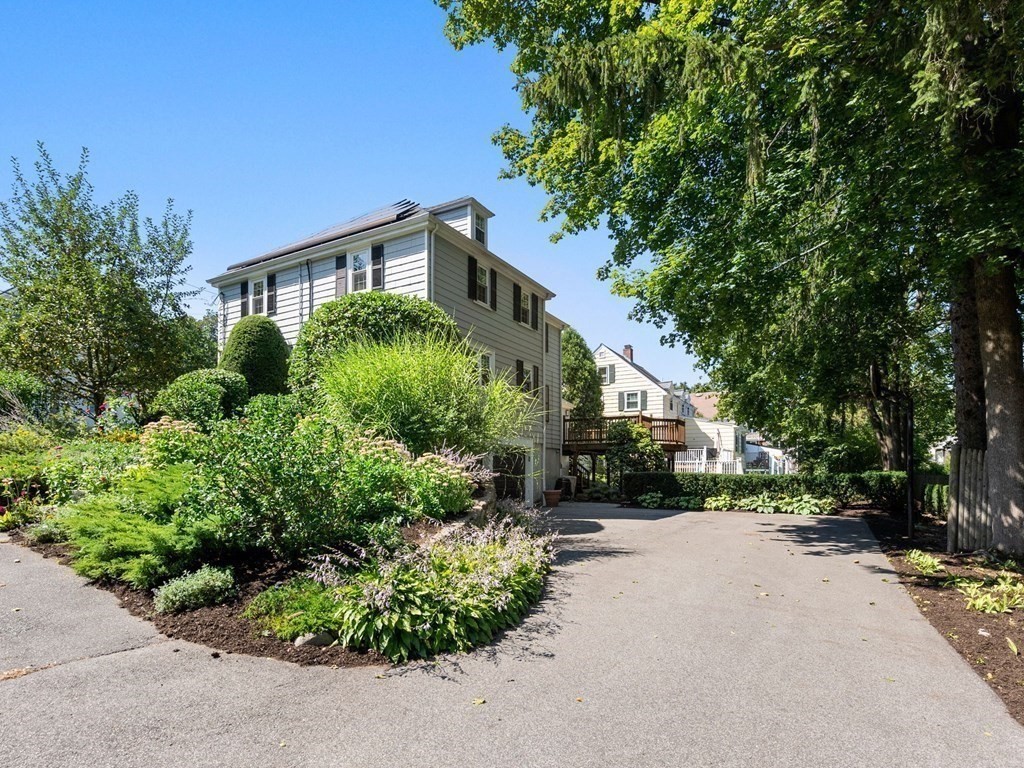 22 Howe Road Newton, MA 02459 - Photo 28 of 31 front view of a house with a street