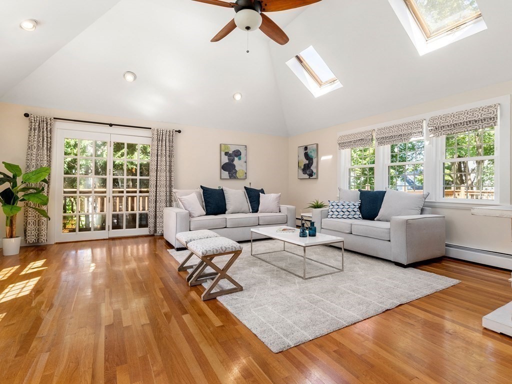 22 Howe Road Newton, MA 02459 - Photo 4 of 31 a living room with furniture and a fireplace