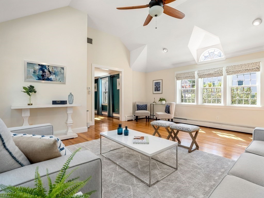 22 Howe Road Newton, MA 02459 - Photo 5 of 31 a living room with furniture and a large window