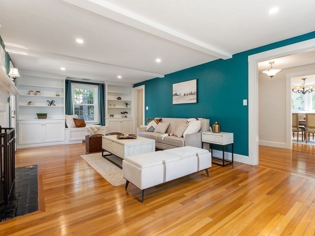 22 Howe Road Newton, MA 02459 - Photo 9 of 31 a living room with furniture and a wooden floor