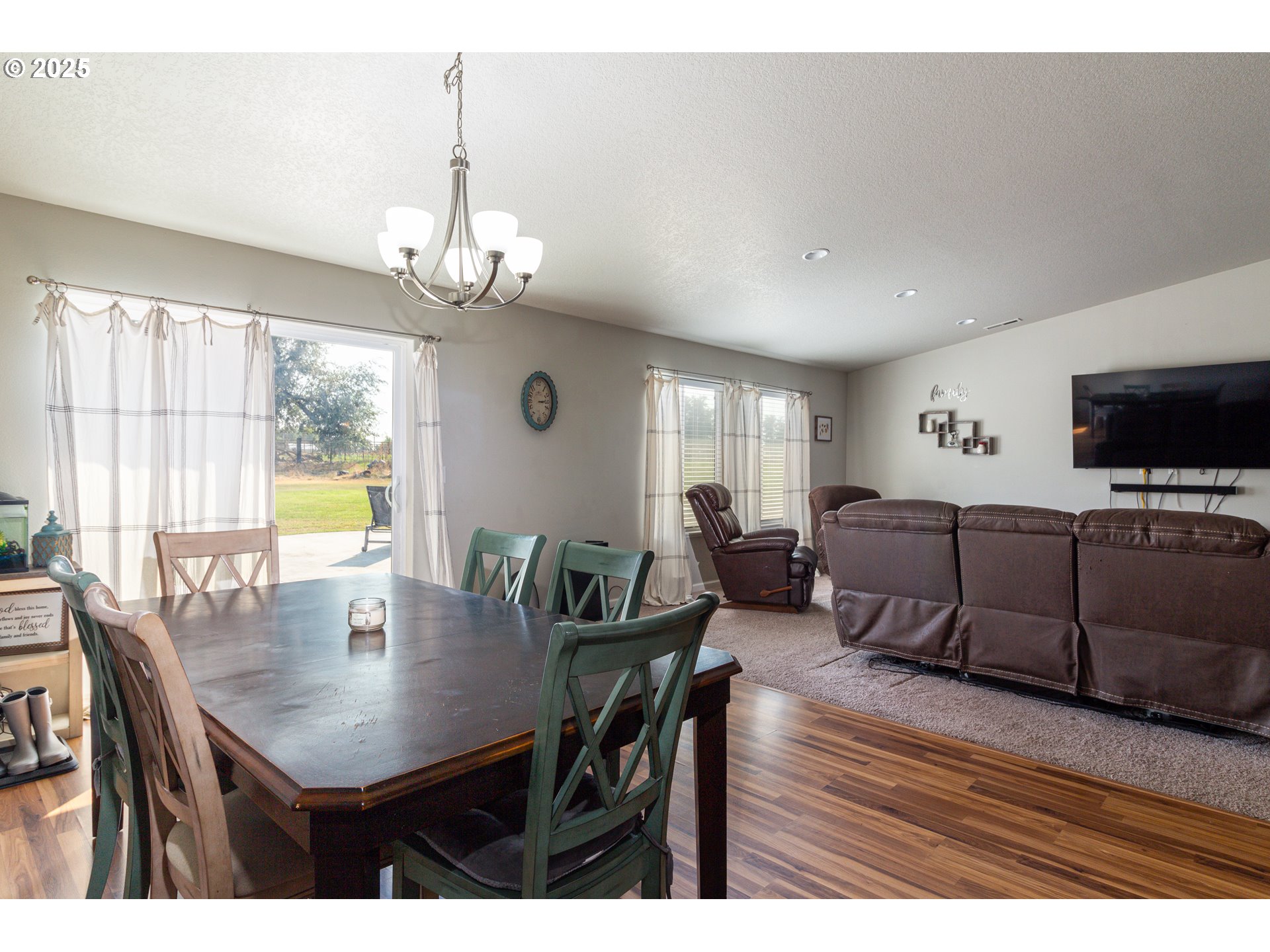 1815 Minnehaha Road Hermiston, OR 97838 - Photo 30 of 34 a view of a dining room with furniture window and wooden floor