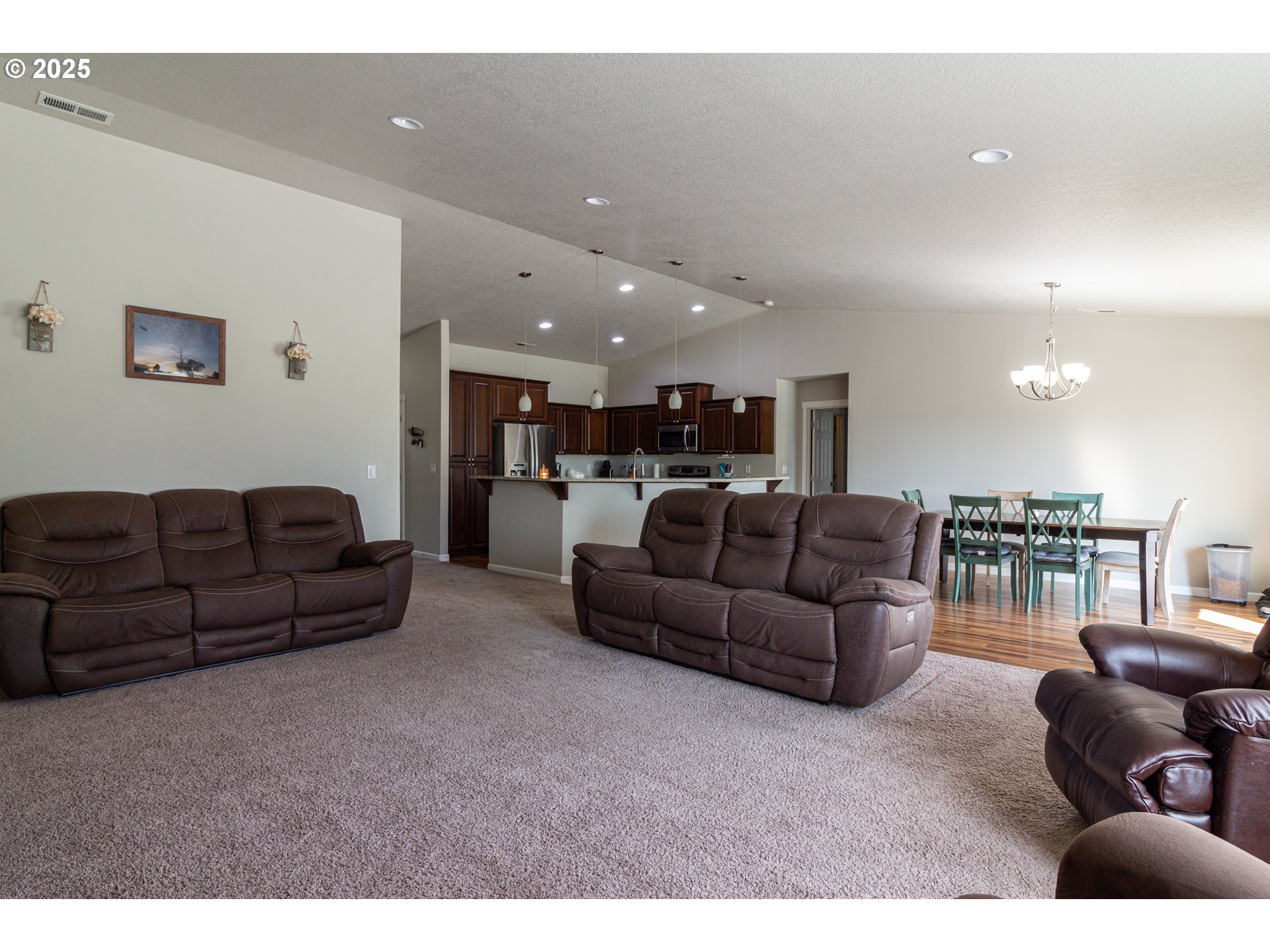 1815 Minnehaha Road Hermiston, OR 97838 - Photo 32 of 34 a living room with furniture and a view of kitchen