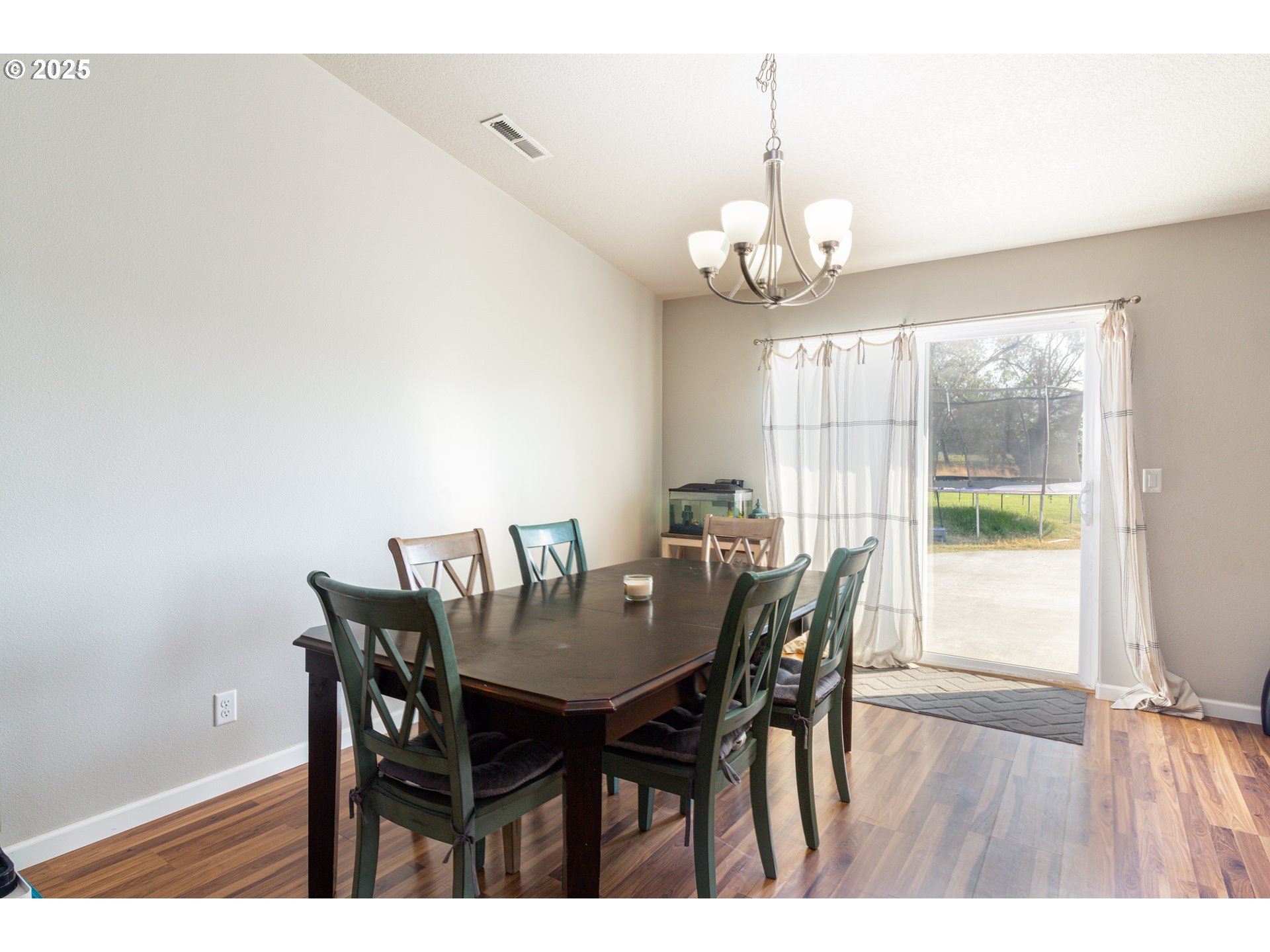 1815 Minnehaha Road Hermiston, OR 97838 - Photo 34 of 34 a view of a dining room with furniture window and wooden floor