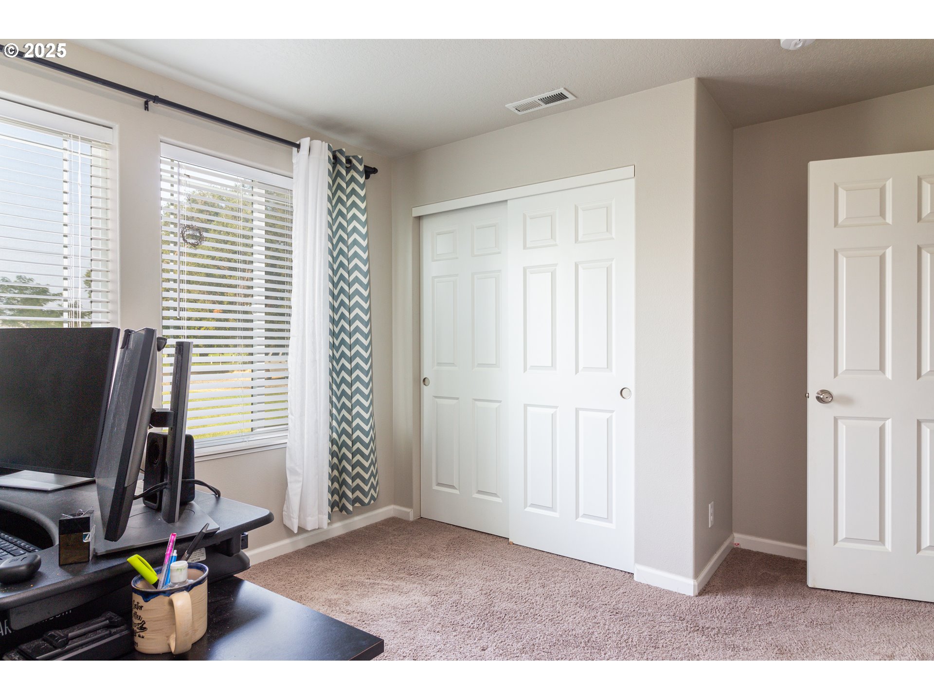1815 Minnehaha Road Hermiston, OR 97838 - Photo 7 of 34 a view of a workspace with furniture and a window