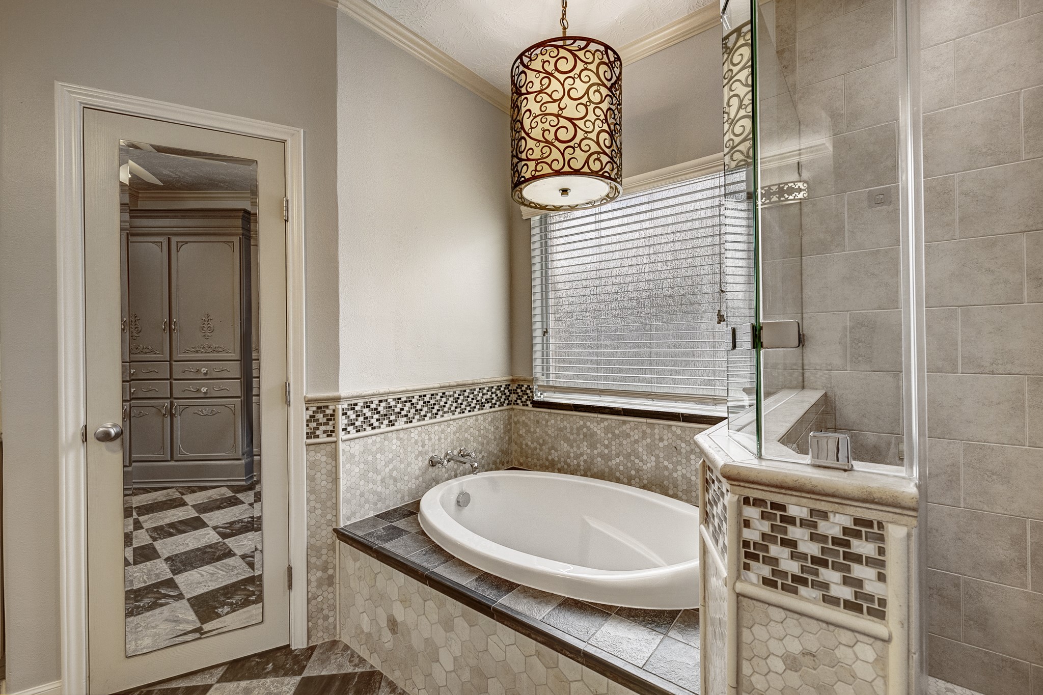 18606 Spring Heather Court Spring, TX 77379 - Photo 29 of 50 Unwind after a long day in this soaking tub with privacy window.