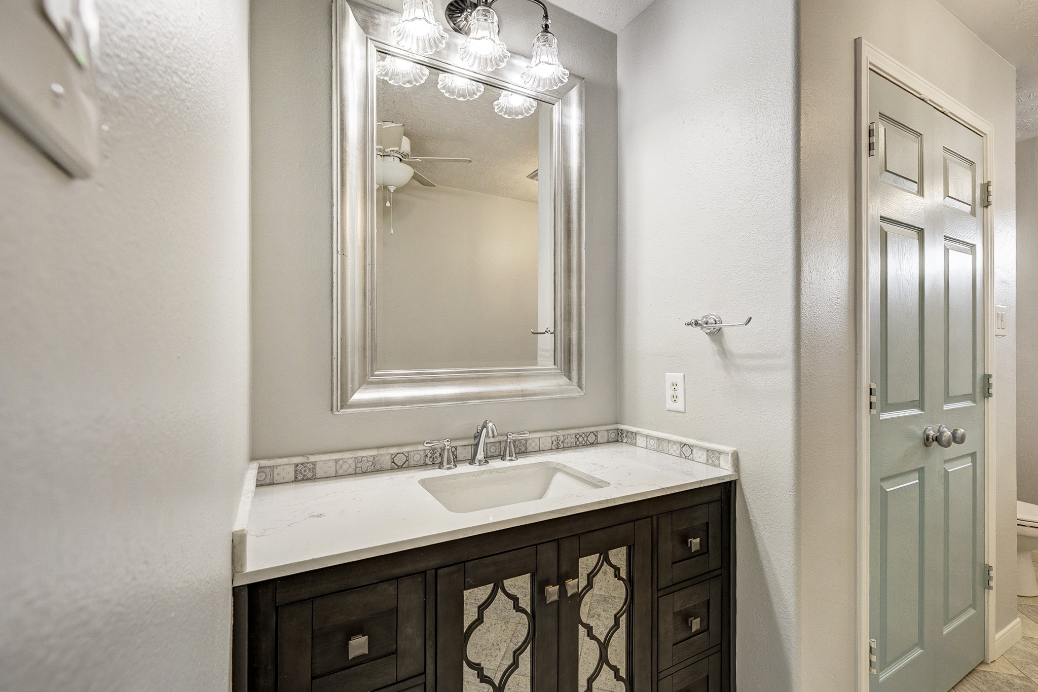 18606 Spring Heather Court Spring, TX 77379 - Photo 42 of 50 upgraded sink, mirror and storage cabinet in addition to storage closet in bathroom