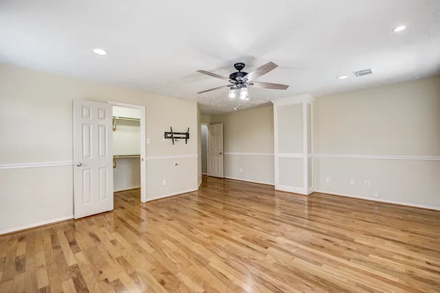 a view of swimming pool with a patio and a yard