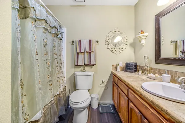 a view of a patio with furniture and a potted plants